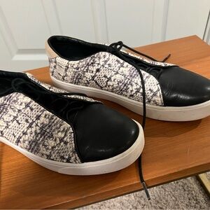 Women’s Cole Haan Black and White Slip-On Sneakers